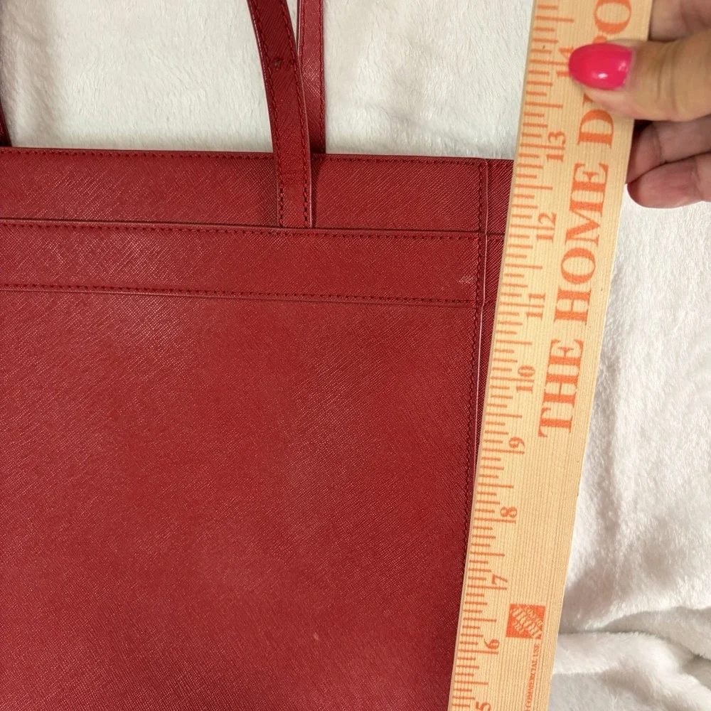Kate Spade New York Kirk Park Pink Saffiano Crosshatch‎ leather Leather bow EUC